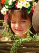 Cozy ukrainian baby girl with garland