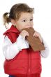 adorable girl eating chocolate