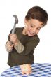adorable boy breaking the money box