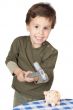 adorable boy breaking the money box