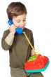 adorable boy speaking on the telephone