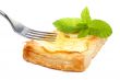 Fork and apple tart on a dish