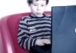 child with laptop