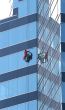 Window Washer on Blue Glass