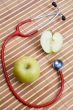 stethoscope and apple