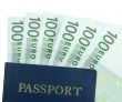 Passport and One Hundred Euro Bills
