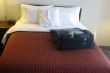 luggage in hotel room