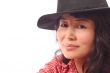Asian girl in black hat