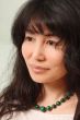 Asian girl in malachite beads