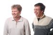 Two young men laughing