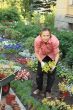 Woman planting out sprouts
