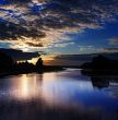 Sunset clouds above lake