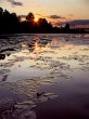 sunset above the silent river