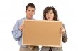 Holding the empty corkboard