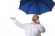 Man under blue umbrella