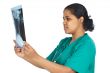 doctor examining a radiographs