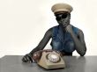 African girl with old phone
