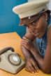 African girl with old phone