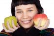 adolescent with apples