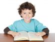Adorable boy studying