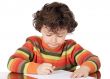 adorable boy studying