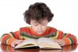 adorable boy studying
