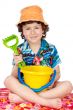 adorable boy playing in the beach