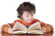 adorable happy boy studying