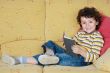adorable boy reading