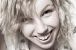 Portrait of a beautifull curly blond