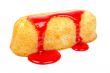 Strawberry syrup over a cake