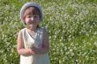 Girl with bouquet of clover