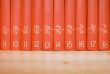 Encyclopedia in a Wooden Bookshelf