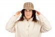 Woman holding hat