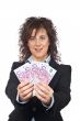 Holding a fan of money