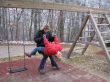 Mother and daughter on a swing