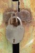Wintage rusty metal gate padlock