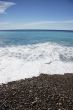 Water lapping on the beach - portrait