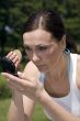 Woman powdering her face
