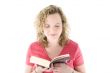 Attractive blonde reading a book