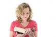 Attractive blonde reading a book