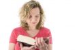 Attractive blonde reading a book