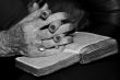 Senior`s hands in prayer