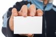 Teenager with a blank card