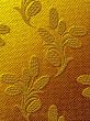 embroidered golden fabric texture