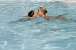  Kissing son and mom in the pool