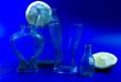 Glass and lemons on a dark blue background