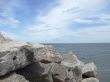 Large Rocks Jut Out to the Water