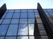 Building Reflected with Pale Blue Sky
