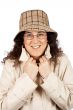 Woman with raincoat and hat